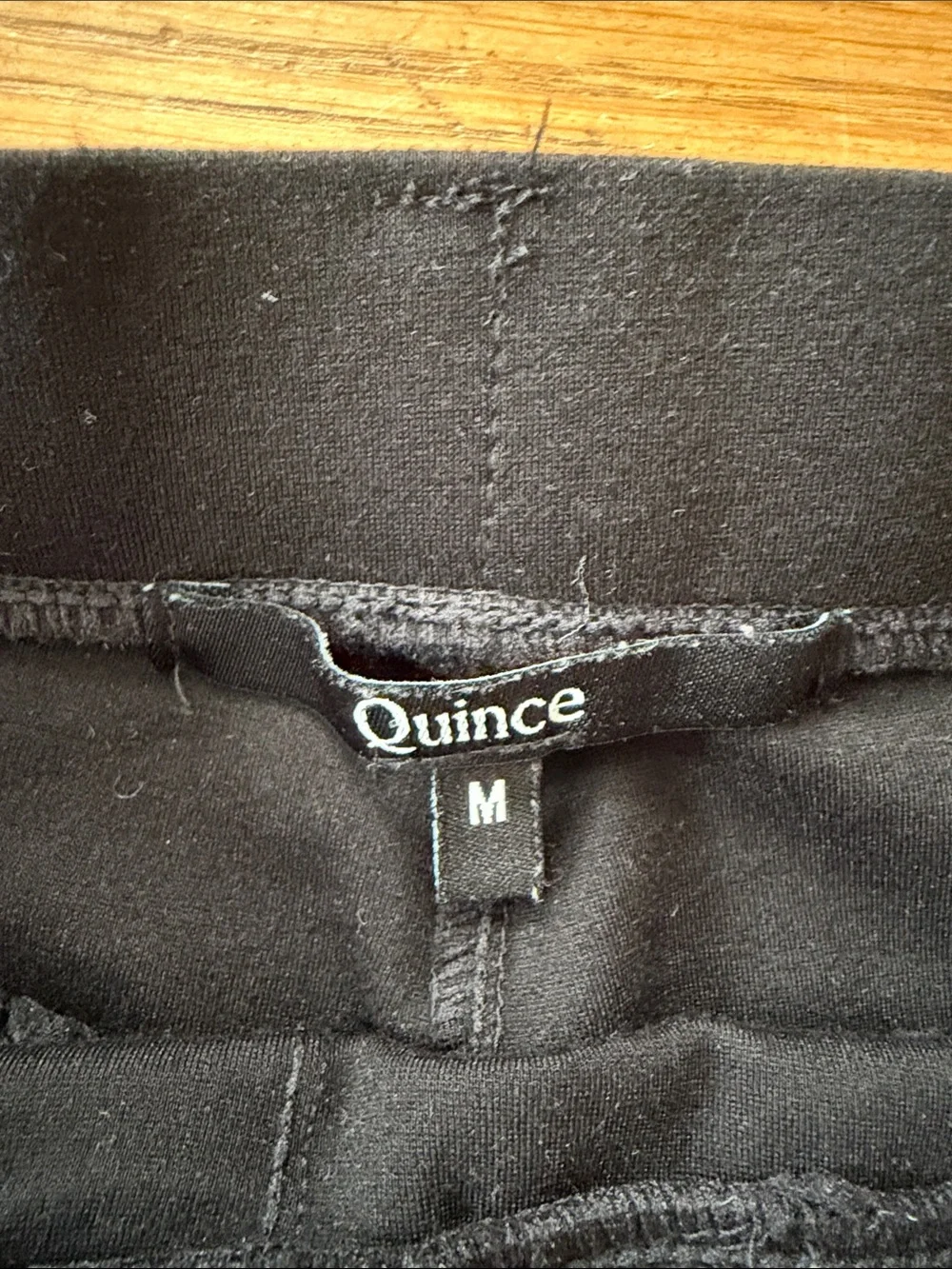 Quince black ultra stretch ponte straight leg pants. Size medium petite.